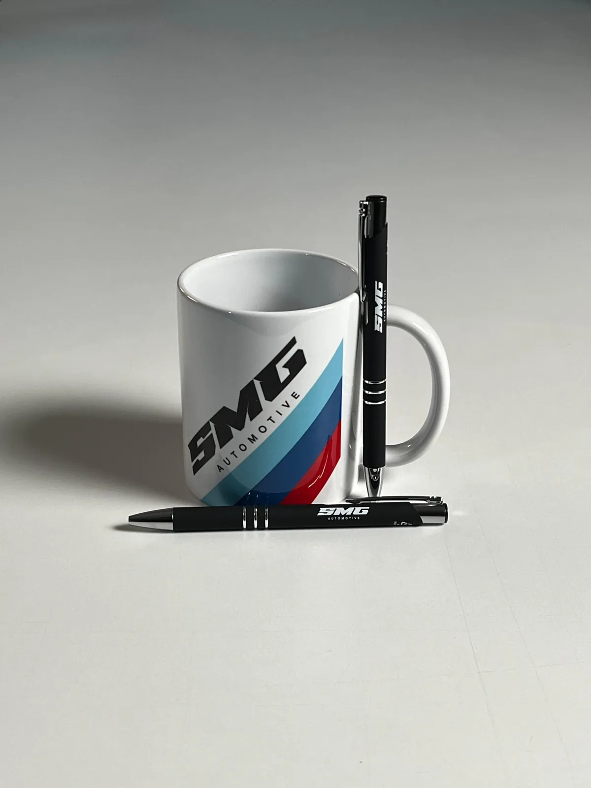Tasse und Kugelschreiber mit Logo